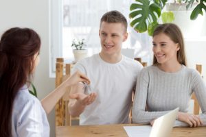 First time home buyer gets the keys to their home.