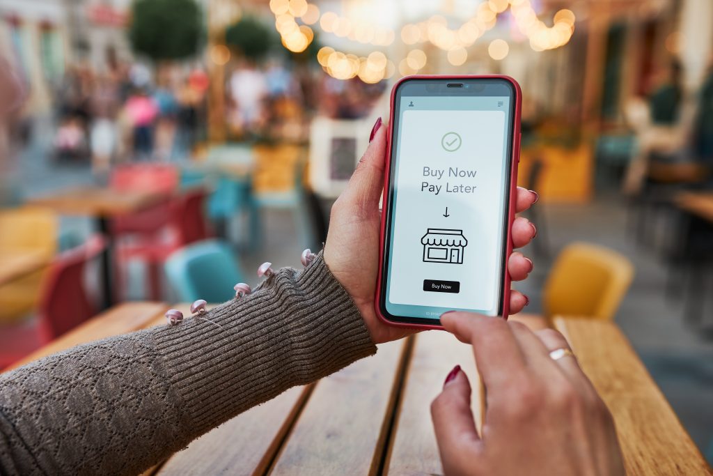 Woman receiving a BNPL offer on her phone